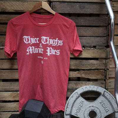 Thicc Thighs & Mince Pies Christmas Gym T-Shirt hanging up